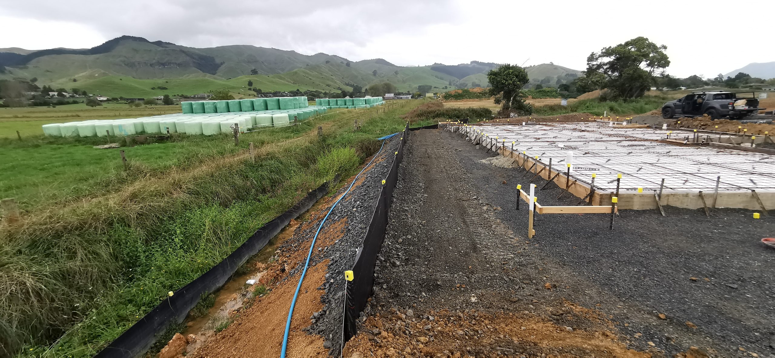 Most erosion happens during the earliest phase of construction because exposed soil has no protection from rainfall or runoff. Preparing controls before breaking ground prevents sediment from leaving the site when storms hit.