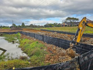 A silt fence helps control erosion indirectly by trapping sediment carried by surface runoff before it leaves the disturbed area. When installed along site perimeters or drainage paths, it slows water flow, allowing soil particles to settle and protecting nearby streams and storm drains from sedimentation.