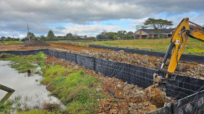 A silt fence helps control erosion indirectly by trapping sediment carried by surface runoff before it leaves the disturbed area. When installed along site perimeters or drainage paths, it slows water flow, allowing soil particles to settle and protecting nearby streams and storm drains from sedimentation.
