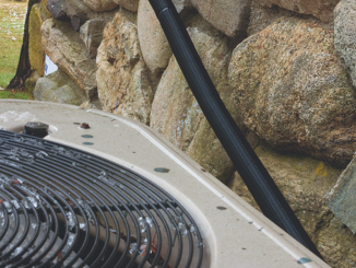 Protective braided sleeving is widely used in construction, forestry, and mining equipment to prevent hose damage in high-movement areas. In many real installations, sleeving shields hydraulic lines from rock chips, heat, and impact hazards. Photo Credit: Techflex®