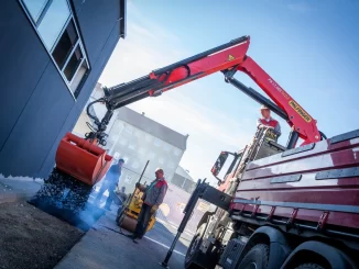 Modern loader cranes allow operators to lift, position, and unload materials even in narrow streets or dense urban environments. Their compact design reduces the need for additional heavy equipment, saving both space and setup time. Photo Credit: PALFINGER AG