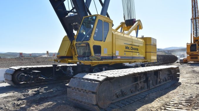 Crawler cranes move on heavy tracks, which gives them stability on soft or uneven ground. They can lift very large loads and work with long boom setups for major construction projects. Photo Credit: Inquipco