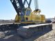 Crawler cranes move on heavy tracks, which gives them stability on soft or uneven ground. They can lift very large loads and work with long boom setups for major construction projects. Photo Credit: Inquipco