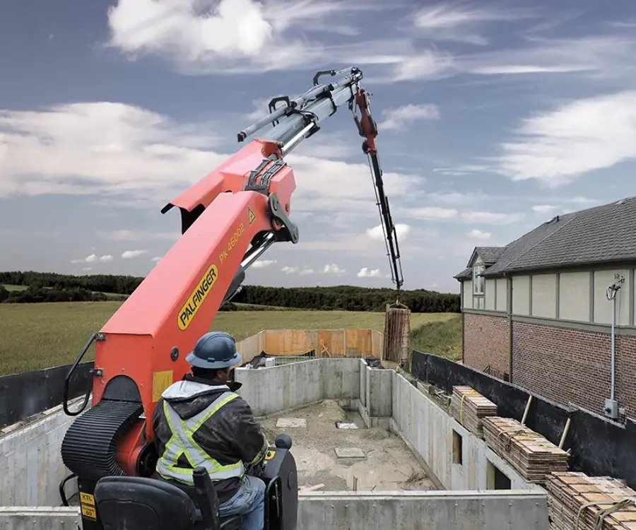 Knuckle boom cranes help crews set concrete forms with better speed and control, leading to higher productivity and lower operating costs. Their long reach and smooth handling make accurate placement of forming cages much easier on any job site. Photo Credit: PALFINGER AG