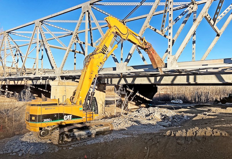 Controlled interior demolitions rely on specialized equipment fitted with hydraulic attachments for precision and reduced vibration. Proper lighting, ventilation, and continuous monitoring maintain worker safety in enclosed environments. Photo Credit: Veit