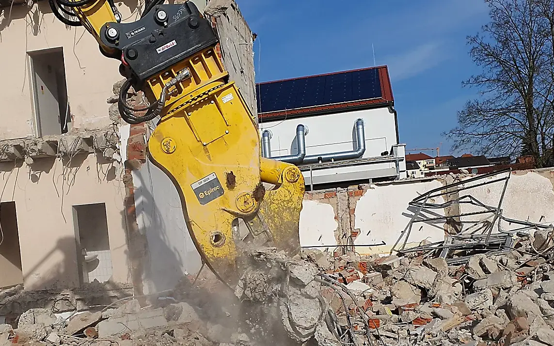 Pulverizers are designed to crush concrete and separate embedded steel during demolition. They improve recycling efficiency by reducing material size directly on site. Photo Credit: Epiroc USA