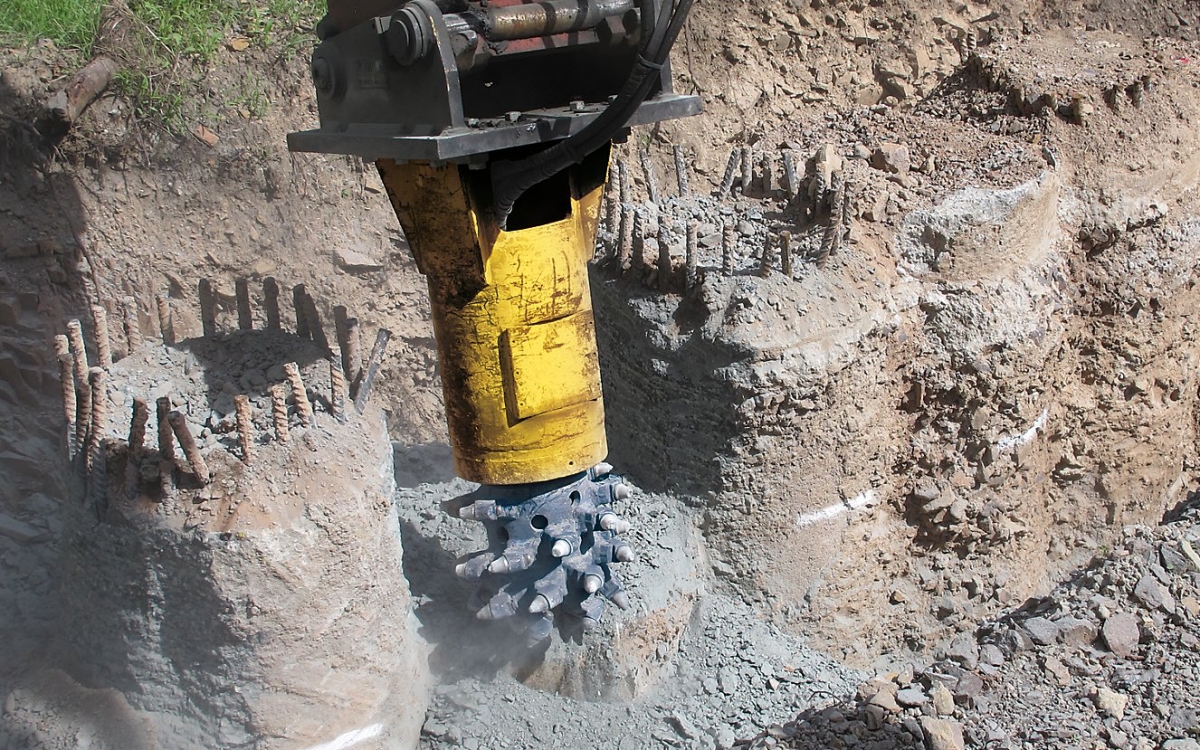 Drum cutters use rotating drums with cutting tools to mechanically excavate rock and concrete. This method produces lower vibration and allows for controlled material removal in confined or sensitive job sites. Photo Credit: Epiroc USA
