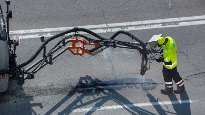 Urban roads deteriorate faster because they handle higher traffic volumes, frequent braking, and repeated utility cuts. These stressors accelerate pavement fatigue and increase the demand for regular maintenance.