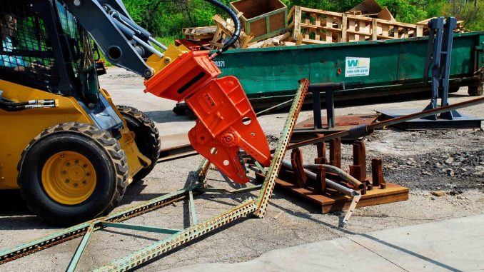 Demolition shears use hydraulic force and hardened blades to cut structural steel cleanly rather than fracturing it through impact. This controlled cutting method reduces vibration and improves jobsite safety during heavy civil demolition. Photo Credit: NPK Construction Equipment, Inc.