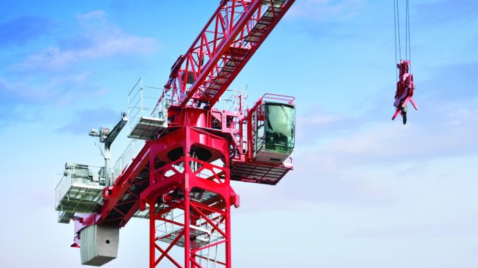 Tower cranes require engineered foundations that must be designed based on soil conditions and crane load data. If this step is rushed or miscalculated, contractors often face costly redesigns and project delays. Photo Credit: Reynolds Rigging & Crane Service, Inc.