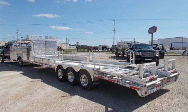 Lower trailer weight reduces fuel consumption for diesel tow vehicles over long distances. Contractors running high mileage routes often recover the price difference through fuel savings alone. Photo Credit: Alum-Line Trailers