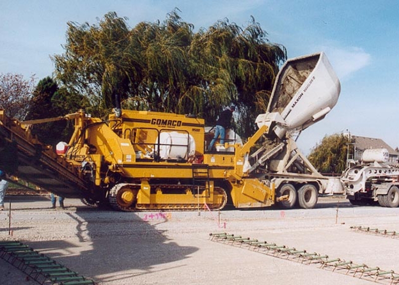 Maintaining concrete freshness is critical in large-scale paving where haul distances and pour durations are extended. Temperature control and delivery timing directly affect workability and finishing quality. Photo Credit: Maxon Industries