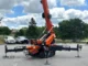 Spider cranes are commonly used in confined spaces because their compact size allows them to pass through narrow access points and operate indoors. Many models also use outriggers that provide stability in tight job site conditions. Photo Credit: Exact Crane & Equipment Corp
