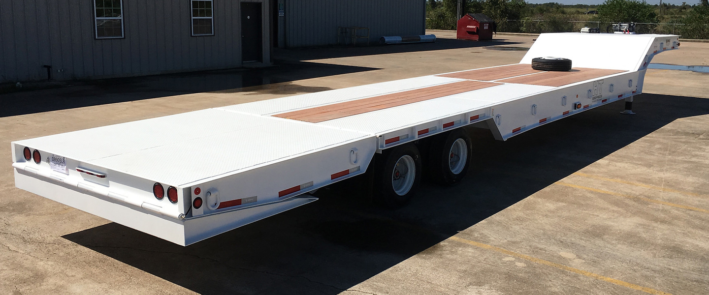 White HT Series gooseneck trailer with hydraulic tail