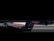Black Interstate 70LBG gooseneck lowboy equipment trailer with wooden deck and tandem axles