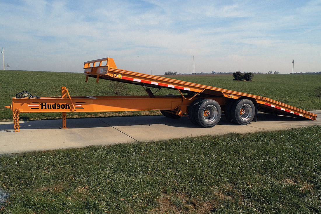 Equipment trailer loaded for construction haul