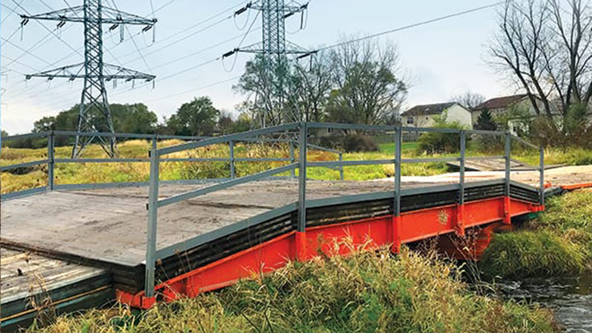 The TerraCross 40 bridge system is designed to clear span up to 35′ with a total bridge length of 40′. Engineered for strength and reliability, it utilizes TerraLam® 500 bearing mats for foundational support and TerraLam® 700 decking mats to create a durable, stable crossing surface. Photo Credit: Sterling Access Solutions