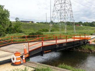 The TerraCross 56 bridge system provides an extended clear span of 50′ with a total bridge length of 56′. Built for larger crossings and increased access demands, it incorporates TerraLam® 500 bearing mats for structural support and TerraLam® 700 decking mats for a strong, dependable driving surface. Photo Credit: Sterling Access Solutions