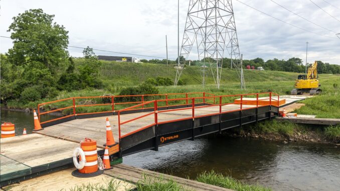 The TerraCross 56 bridge system provides an extended clear span of 50′ with a total bridge length of 56′. Built for larger crossings and increased access demands, it incorporates TerraLam® 500 bearing mats for structural support and TerraLam® 700 decking mats for a strong, dependable driving surface. Photo Credit: Sterling Access Solutions