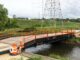 The TerraCross 56 bridge system provides an extended clear span of 50′ with a total bridge length of 56′. Built for larger crossings and increased access demands, it incorporates TerraLam® 500 bearing mats for structural support and TerraLam® 700 decking mats for a strong, dependable driving surface. Photo Credit: Sterling Access Solutions